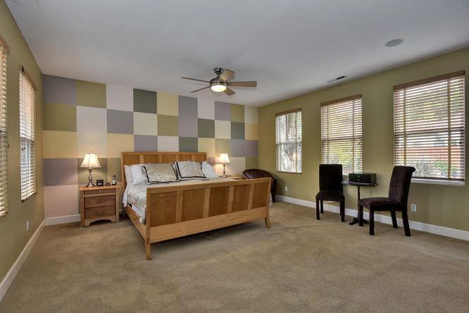 2820 Club Drive Gilroy, CA 95020 - Photo 21 of 43 a bedroom with furniture and a large window