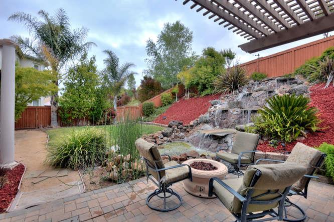 2820 Club Drive Gilroy, CA 95020 - Photo 29 of 43 a view of a chairs and table in backyard