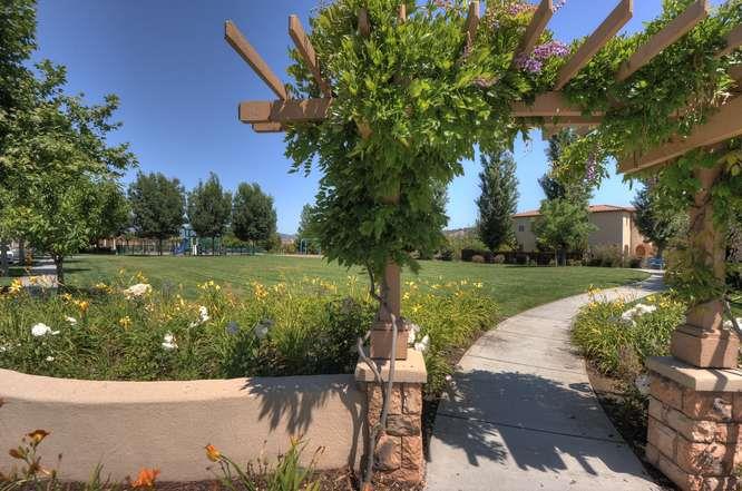 2820 Club Drive Gilroy, CA 95020 - Photo 33 of 43 a view of a swimming pool with a garden