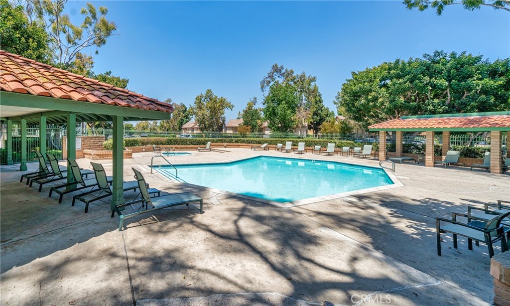 302 Lemon Grove Irvine, CA 92618 - Photo 6 of 6 an outdoor space with swimming pool and furniture