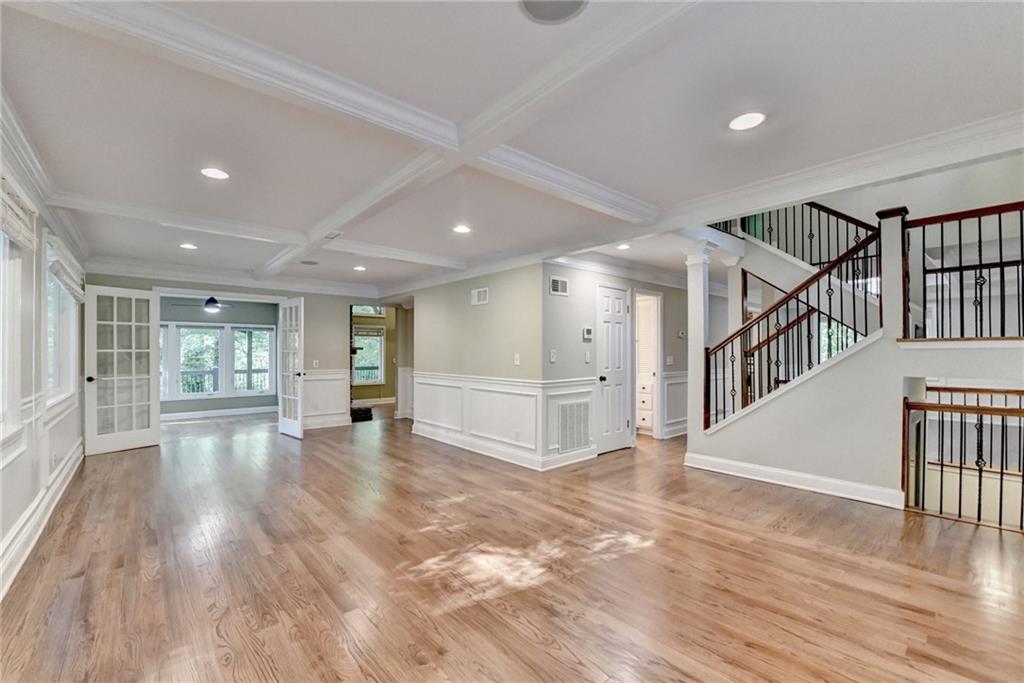 975 Timber Lake Trail Cumming, GA 30041 - Photo 13 of 82 a view of empty room with wooden floor