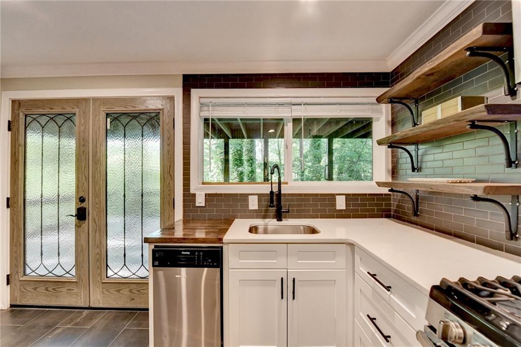 975 Timber Lake Trail Cumming, GA 30041 - Photo 56 of 82 a very nice looking room with a large window and furniture