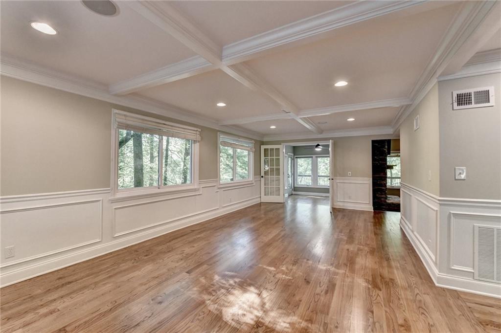 975 Timber Lake Trail Cumming, GA 30041 - Photo 10 of 82 wooden floor in an empty room with a window