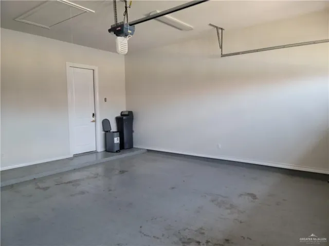 a room with a window and cabinets