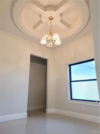 a kitchen with a stove a sink and a refrigerator