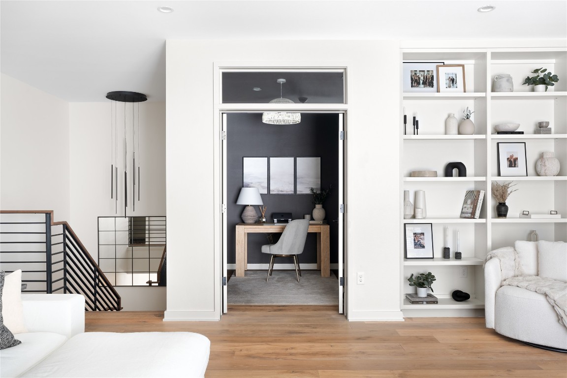 2518 Watkins Way Austin, TX 78746 - Photo 26 of 36 a living room with furniture and a wooden floor