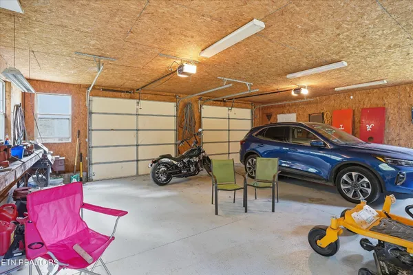 a view of a garage with furniture