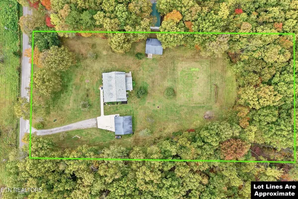 a view of a floor to ceiling window and an outdoor space