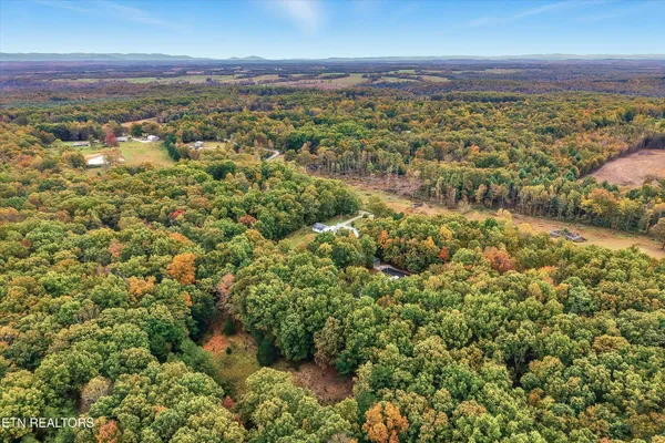 a view of a house with a swimming pool