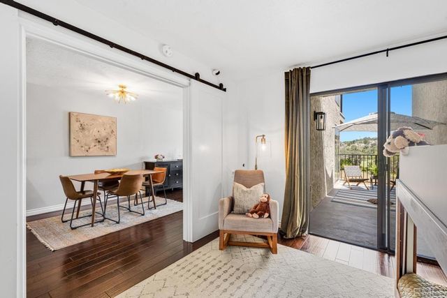 a living room with furniture and a table