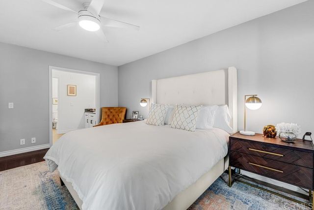 a bedroom with a bed and closet