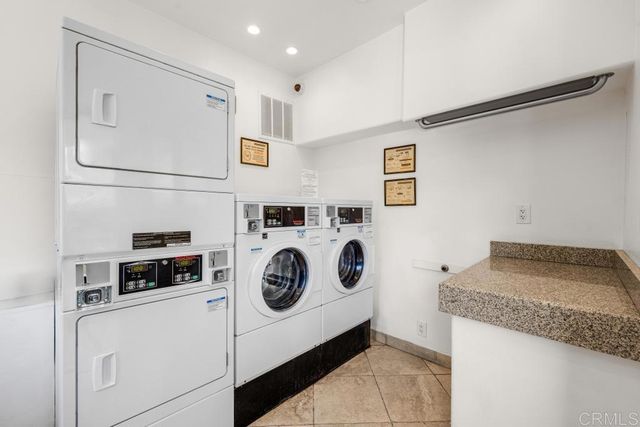 a house with lots of trees in the background