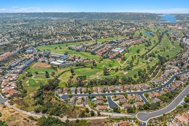 an aerial view of a city with lots of residential buildings