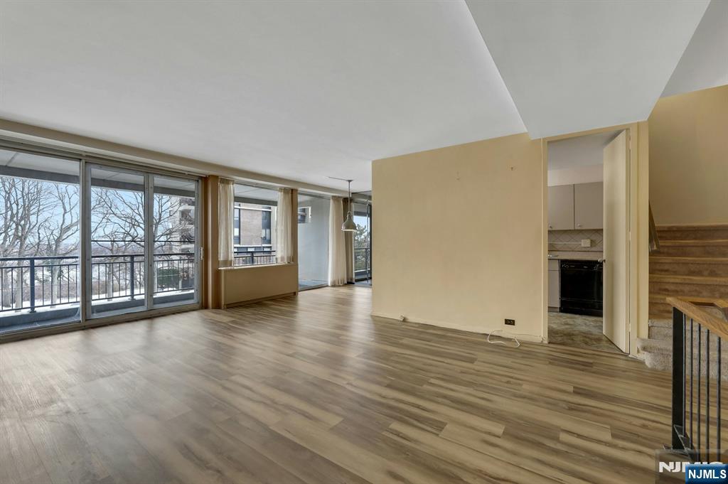 2 Horizon Road, Unit G5 Fort Lee, NJ 07024 - Photo 12 of 46 wooden floor in an empty room with a window