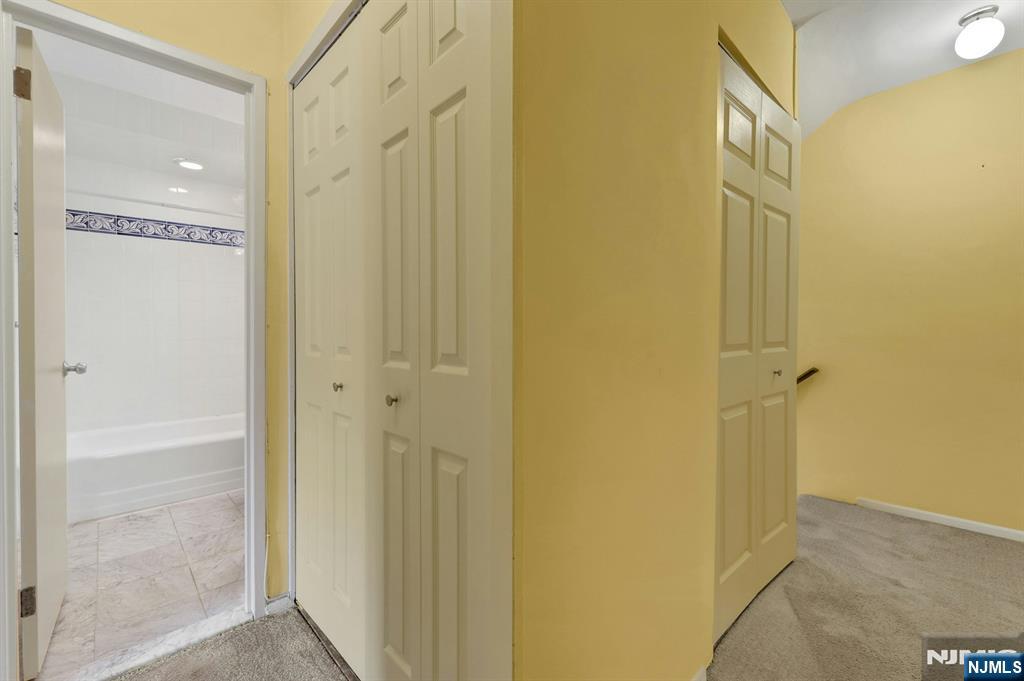 2 Horizon Road, Unit G5 Fort Lee, NJ 07024 - Photo 26 of 46 a bathroom with a shower