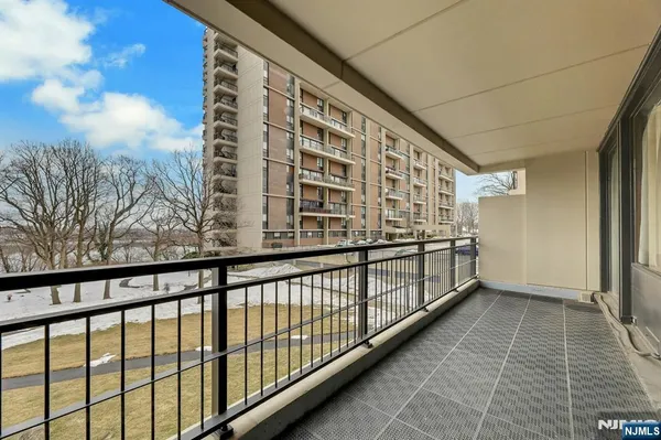 a view of balcony with a potted plant