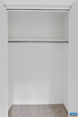 a view of swimming pool with lounge chair