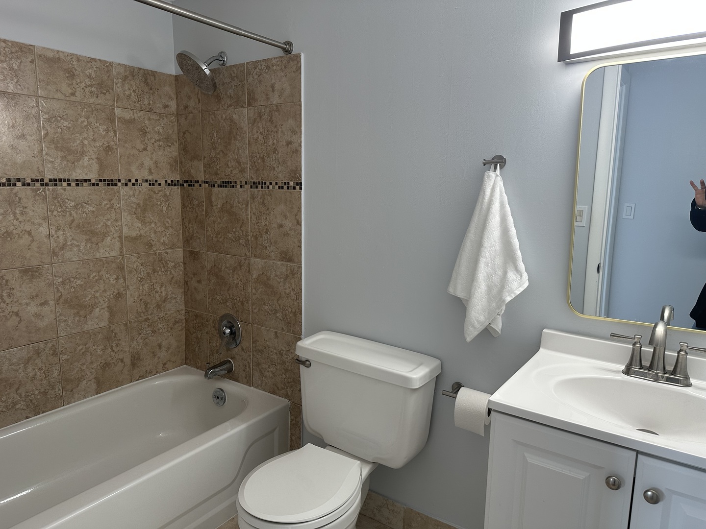 1463 Mercury Drive, Unit 304 Schaumburg, IL 60193 - Photo 11 of 13 a bathroom with a sink toilet and shower