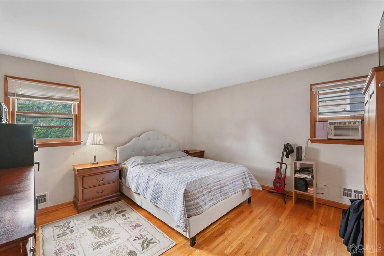 19 Spencer Street Edison, NJ 08817 - Photo 11 of 23 a bedroom with a bed and a window