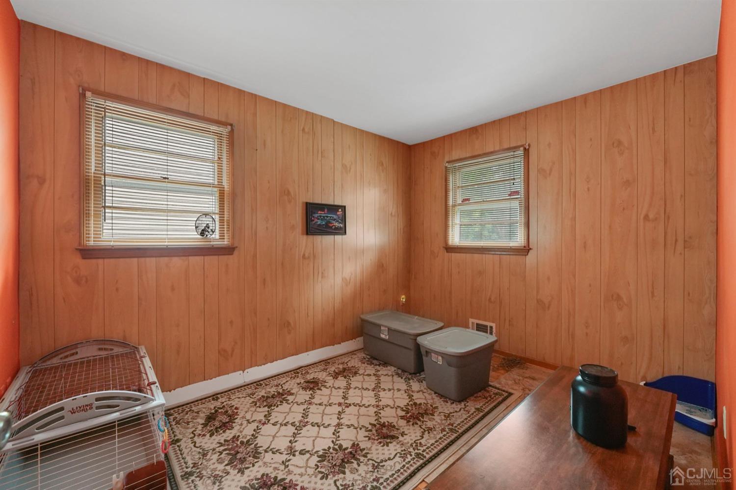 19 Spencer Street Edison, NJ 08817 - Photo 13 of 23 a living room with a couch and a window