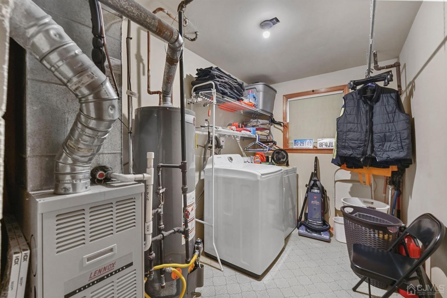 19 Spencer Street Edison, NJ 08817 - Photo 19 of 23 a utility room with dryer and washer