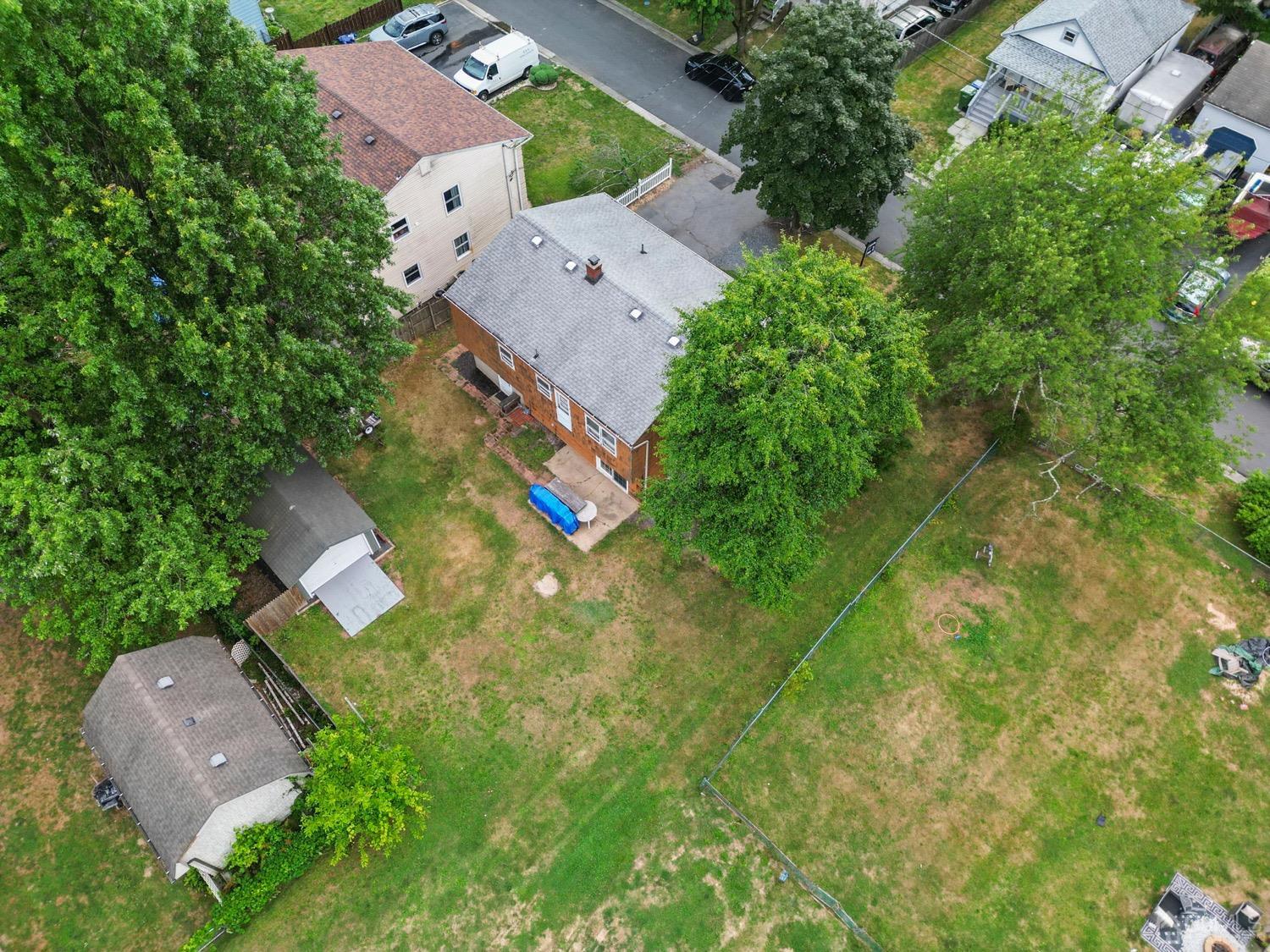 19 Spencer Street Edison, NJ 08817 - Photo 21 of 23 an aerial view of house with yard swimming pool and outdoor seating