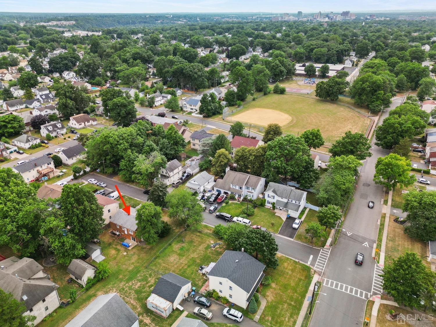19 Spencer Street Edison, NJ 08817 - Photo 22 of 23 an aerial view of residential houses with outdoor space and trees