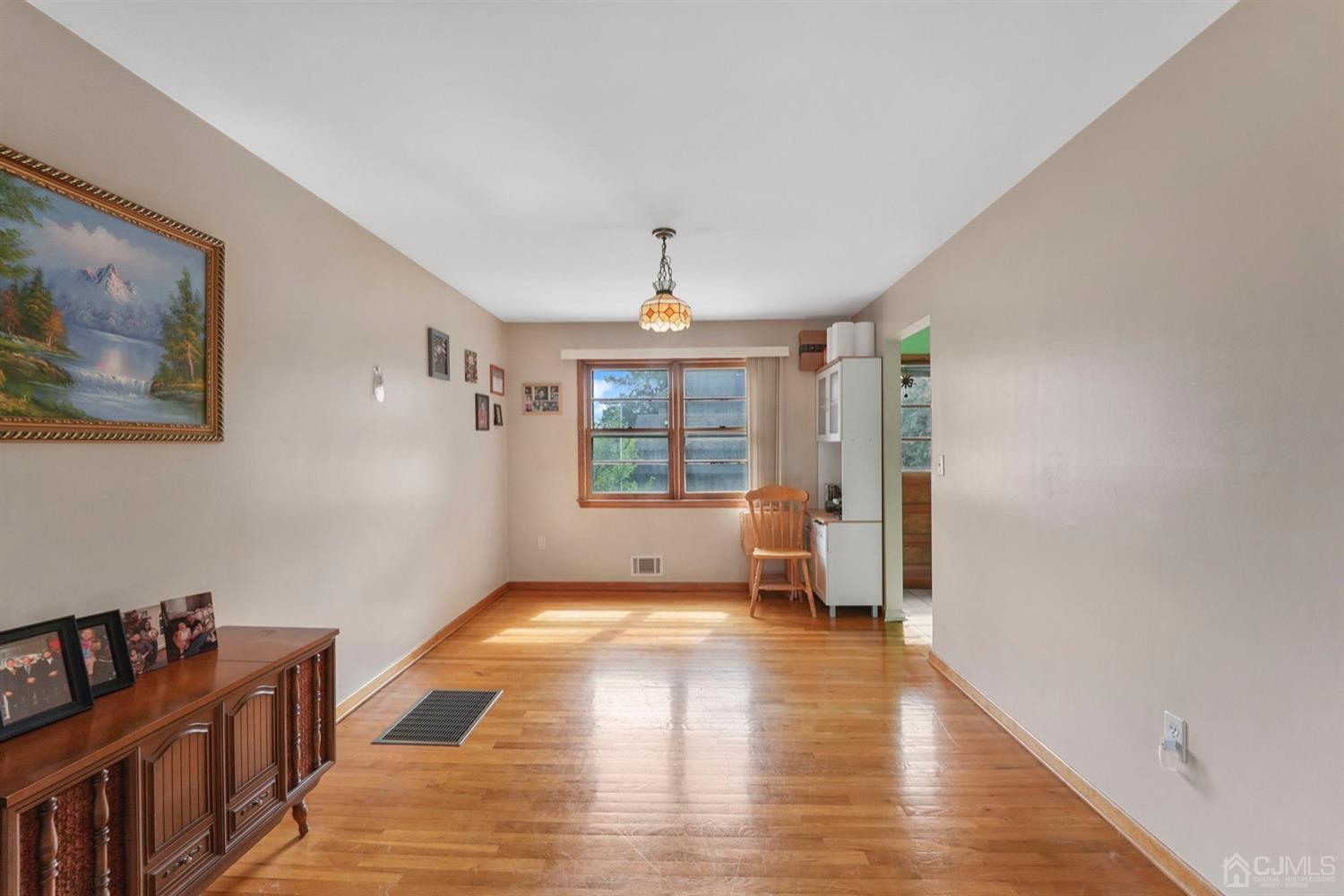 19 Spencer Street Edison, NJ 08817 - Photo 6 of 23 a view of an empty room with a window