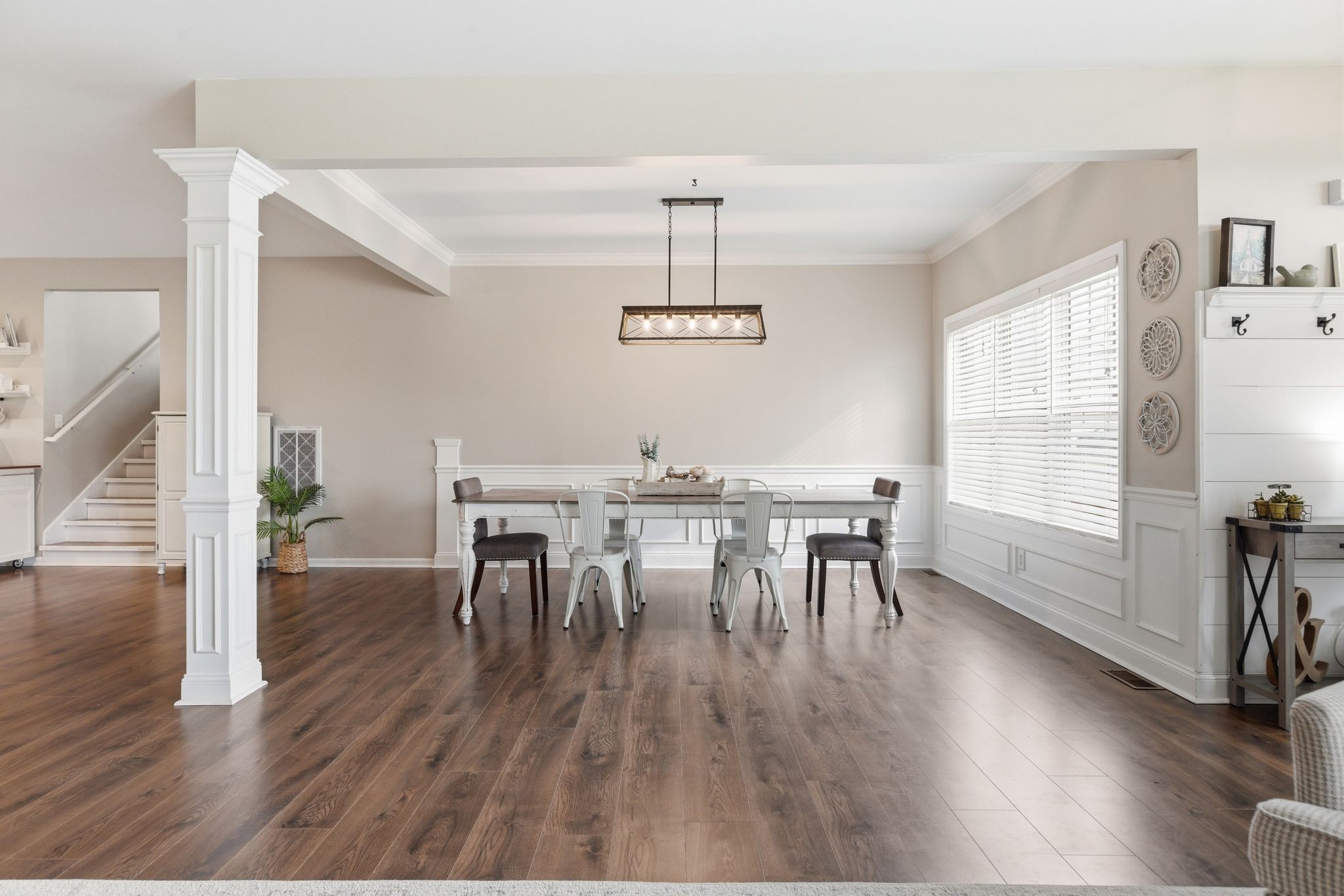 1723 Stephenson Lane Spring Hill, TN 37174 - Photo 13 of 48 a view of a dining room with furniture and wooden floor