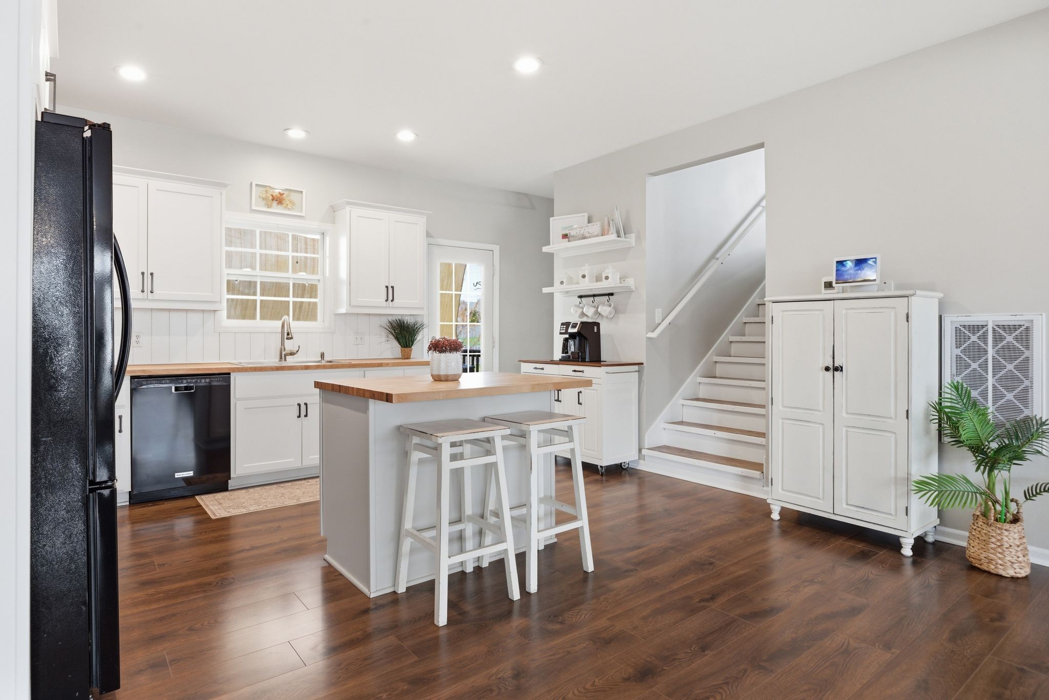1723 Stephenson Lane Spring Hill, TN 37174 - Photo 20 of 48 a kitchen with stainless steel appliances granite countertop a refrigerator a sink dishwasher and a stove with wooden floor