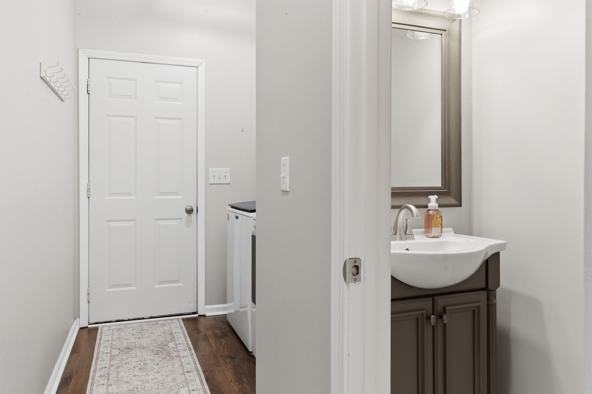 1723 Stephenson Lane Spring Hill, TN 37174 - Photo 24 of 48 a bathroom with a sink a mirror and shower