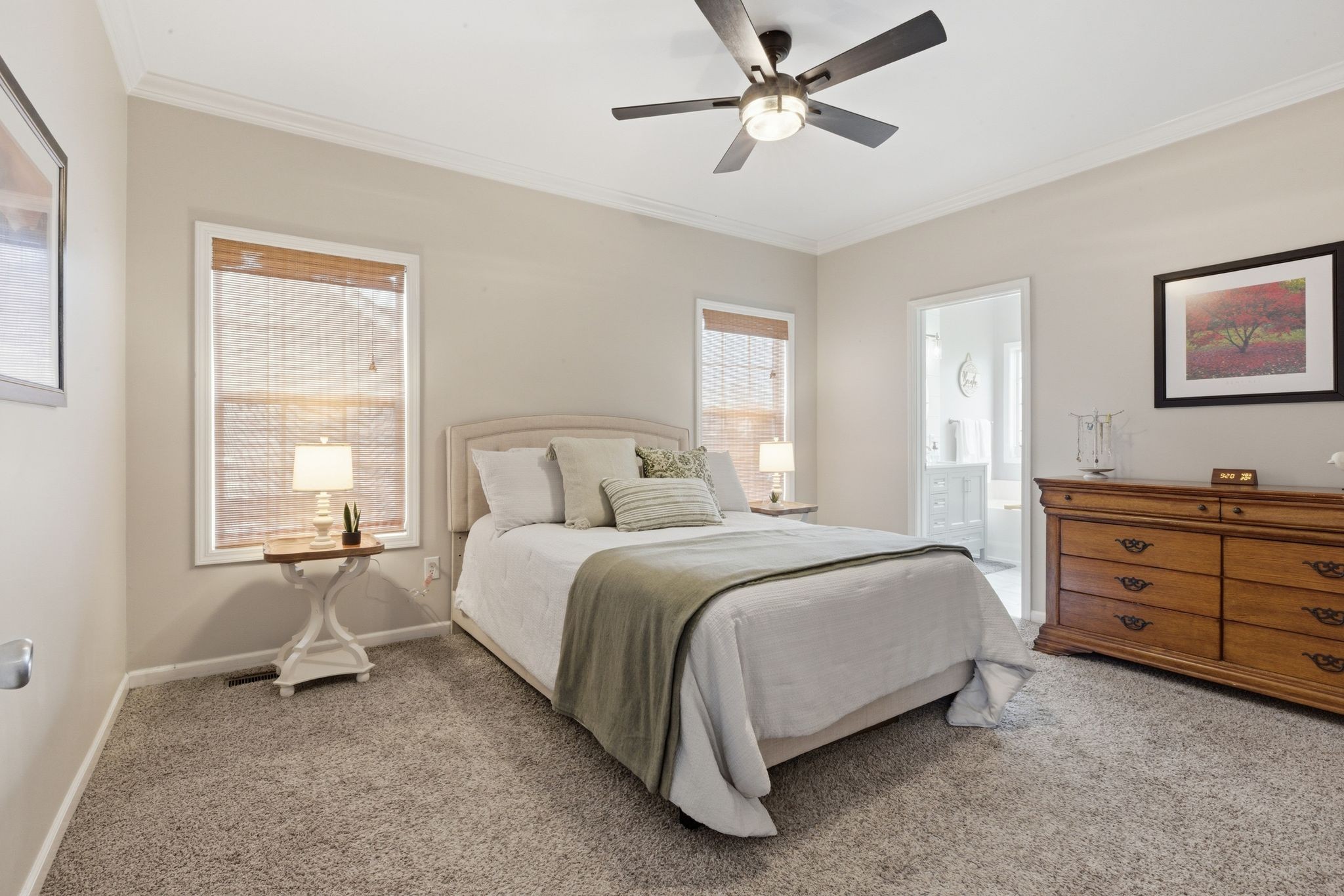 1723 Stephenson Lane Spring Hill, TN 37174 - Photo 26 of 48 a spacious bedroom with a bed a chandelier and a window