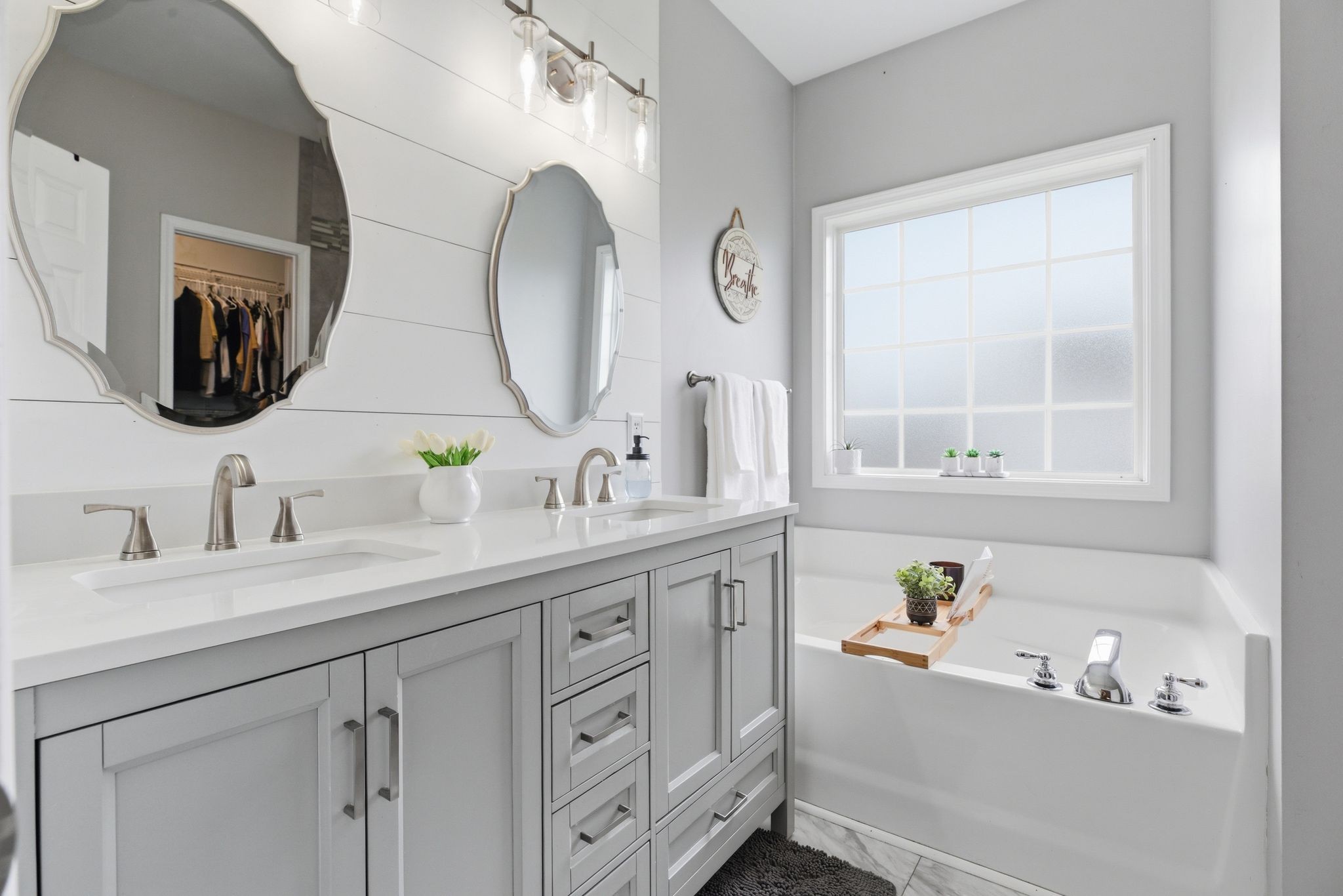 1723 Stephenson Lane Spring Hill, TN 37174 - Photo 29 of 48 a bathroom with a granite countertop sink mirror and bathtub