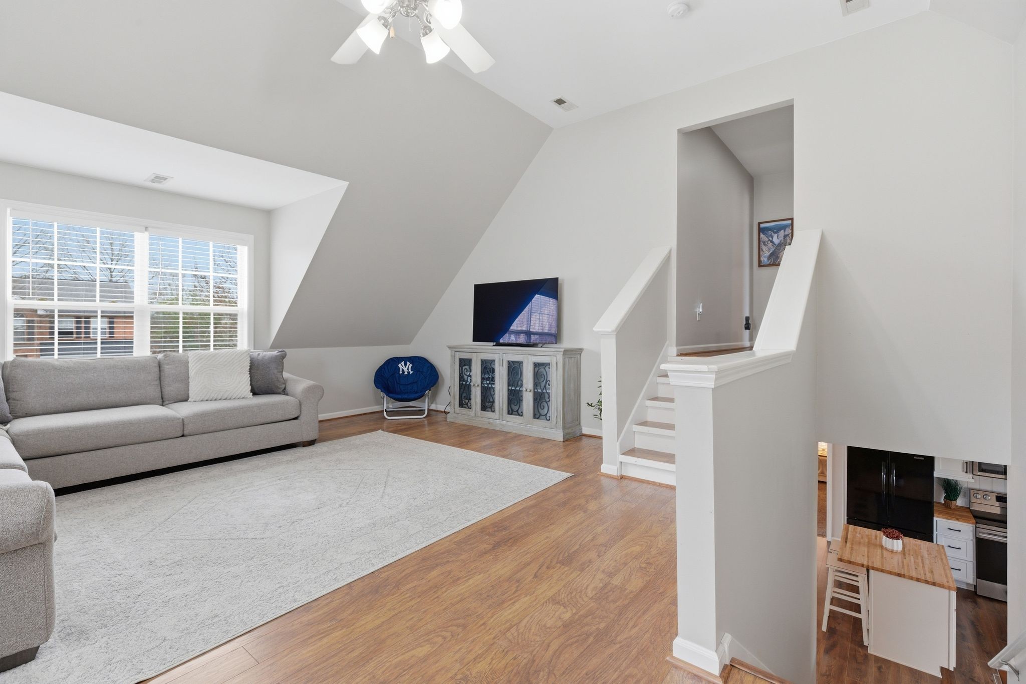 1723 Stephenson Lane Spring Hill, TN 37174 - Photo 32 of 48 a living room with furniture and a flat screen tv