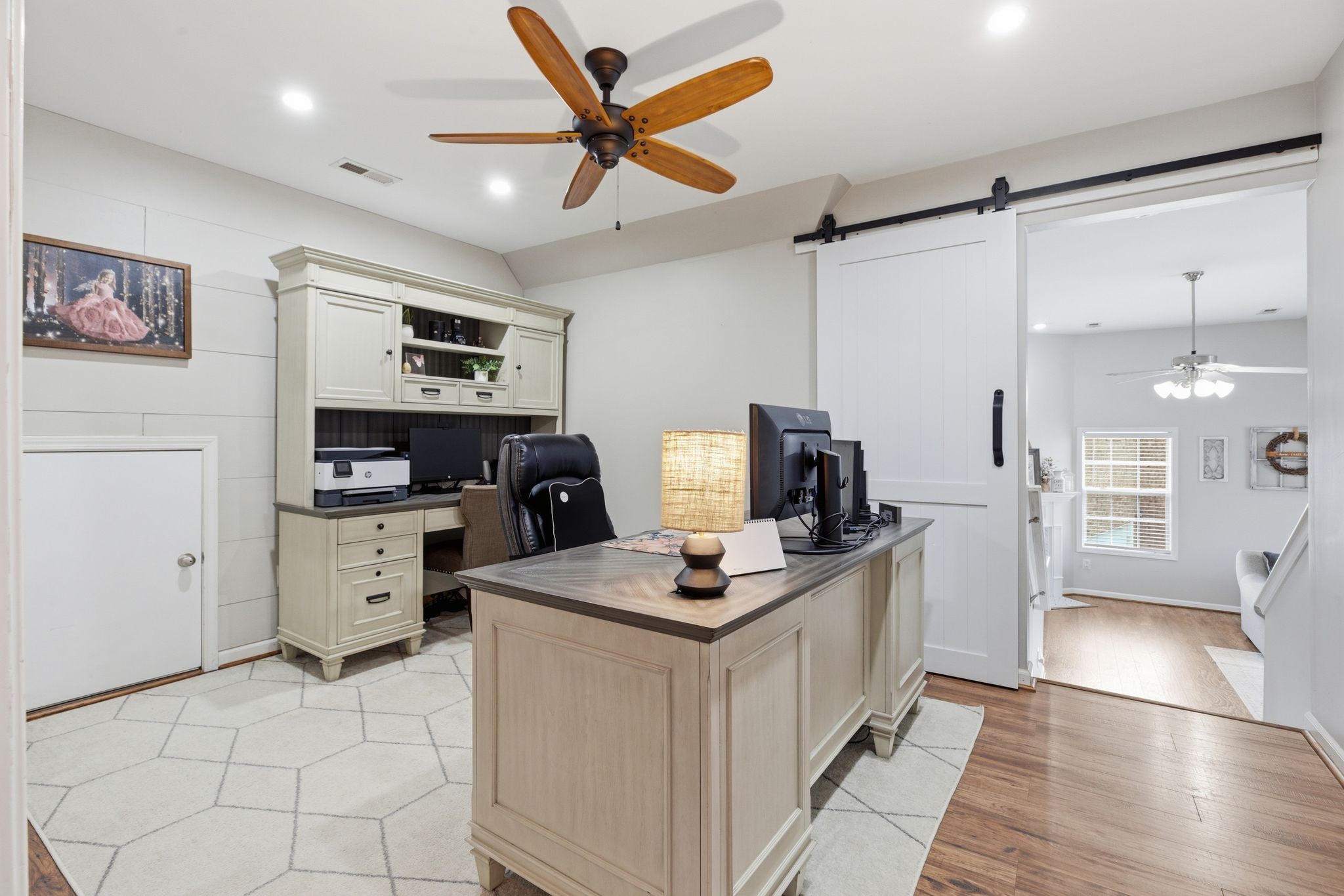 1723 Stephenson Lane Spring Hill, TN 37174 - Photo 35 of 48 a kitchen with stainless steel appliances kitchen island granite countertop a stove top oven a sink a counter top space and cabinets