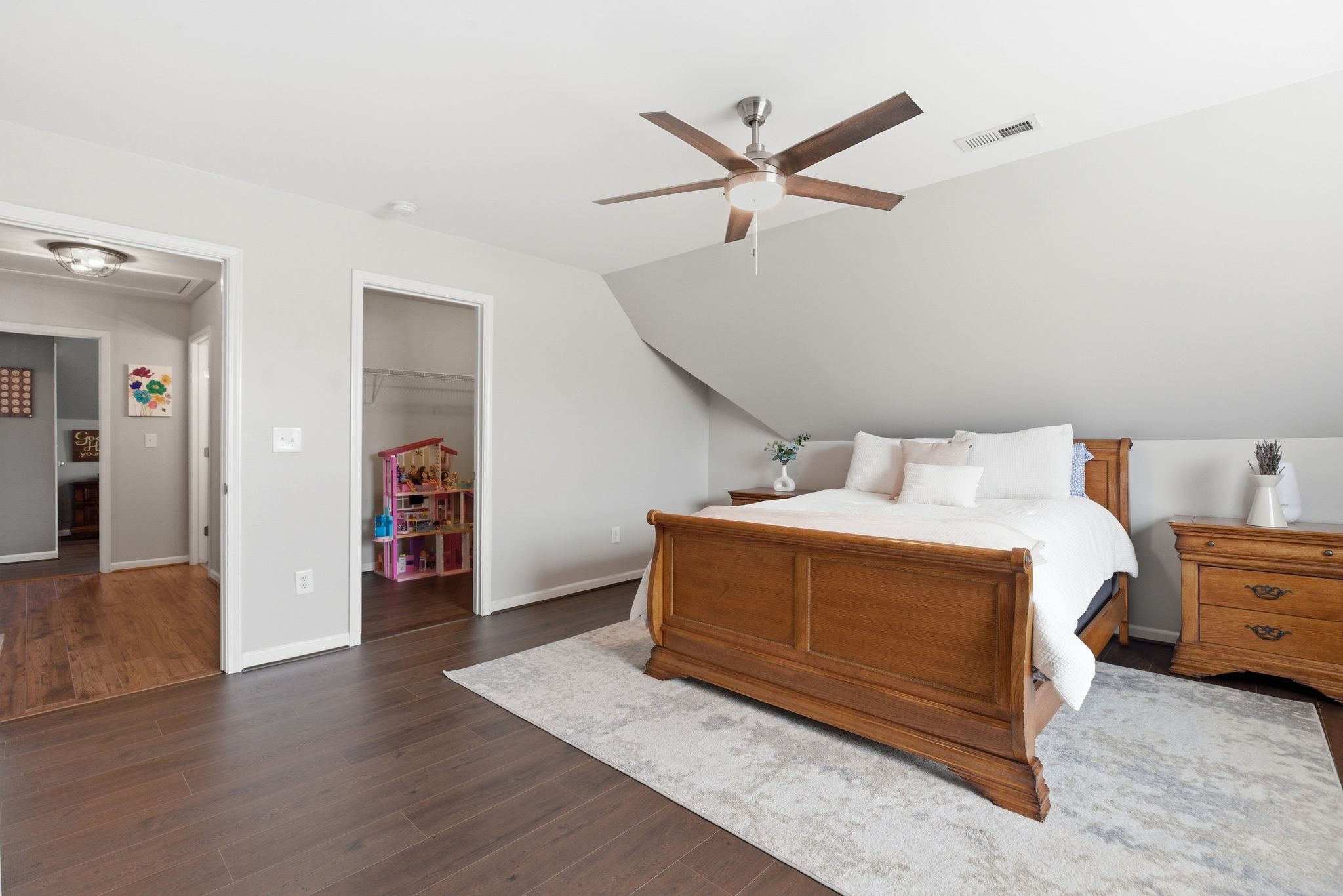 1723 Stephenson Lane Spring Hill, TN 37174 - Photo 37 of 48 a bedroom with a bed and a chandelier