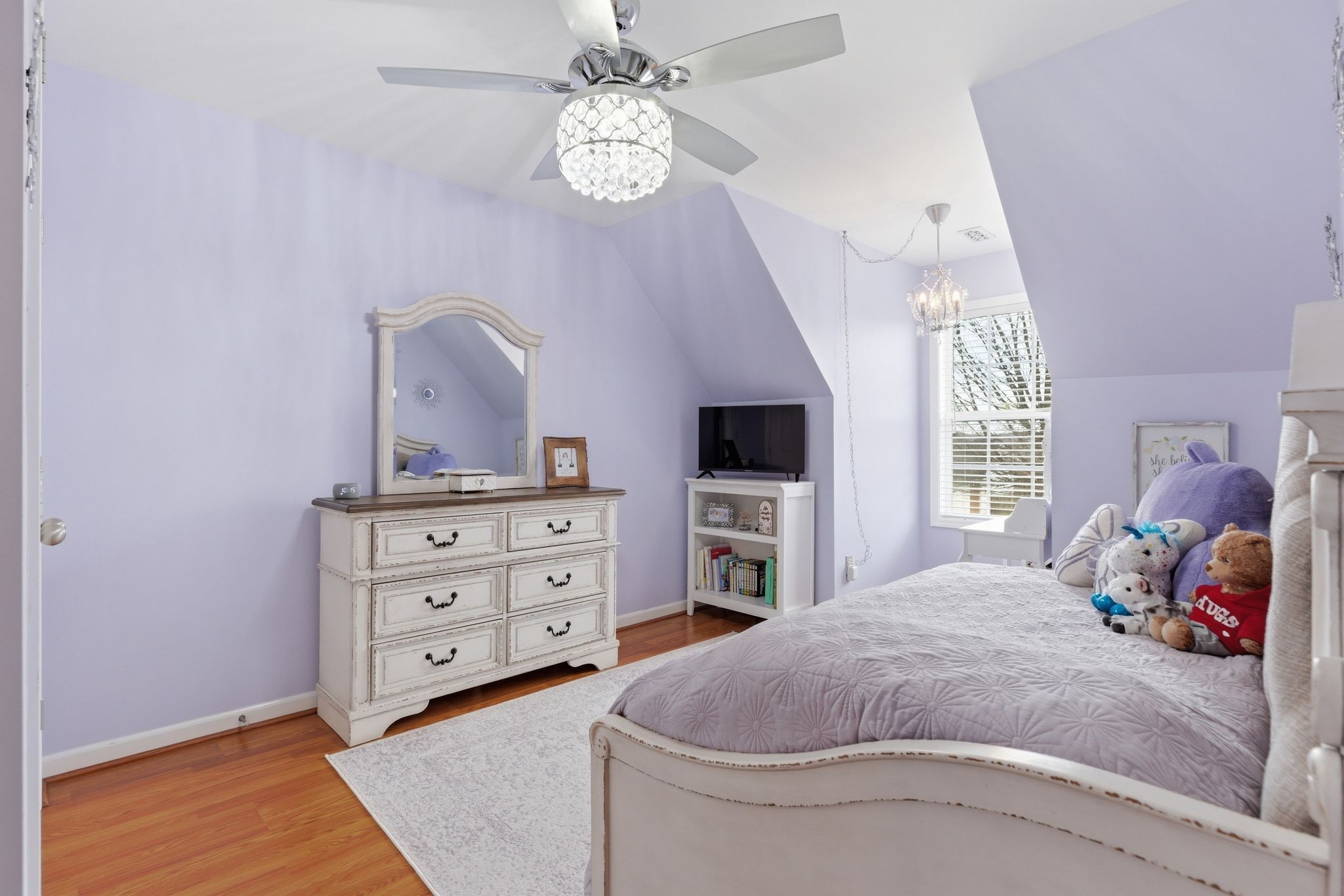 1723 Stephenson Lane Spring Hill, TN 37174 - Photo 40 of 48 a bedroom with a bed and a flat screen tv