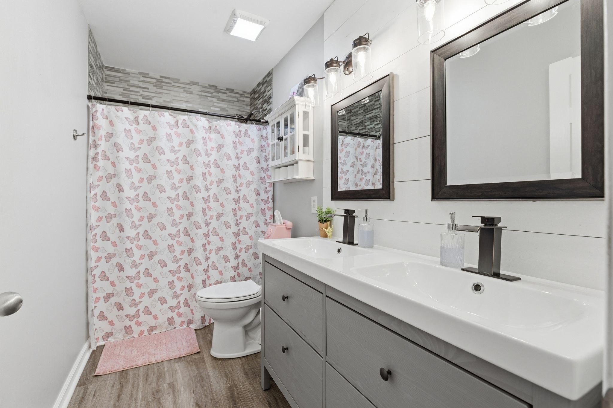 1723 Stephenson Lane Spring Hill, TN 37174 - Photo 43 of 48 a bathroom with a sink a toilet and a mirror