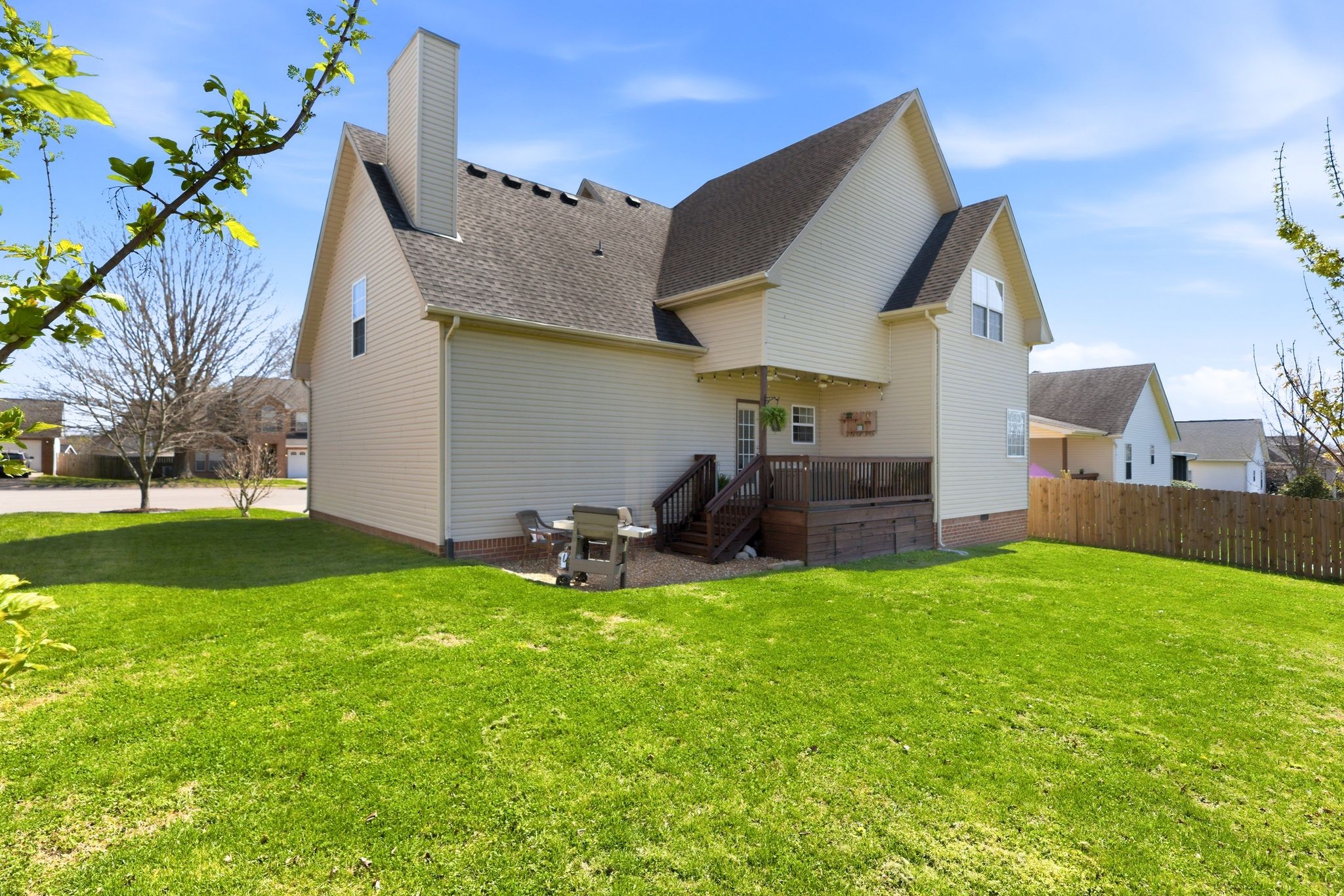 1723 Stephenson Lane Spring Hill, TN 37174 - Photo 44 of 48 a backyard of a house with table and chairs