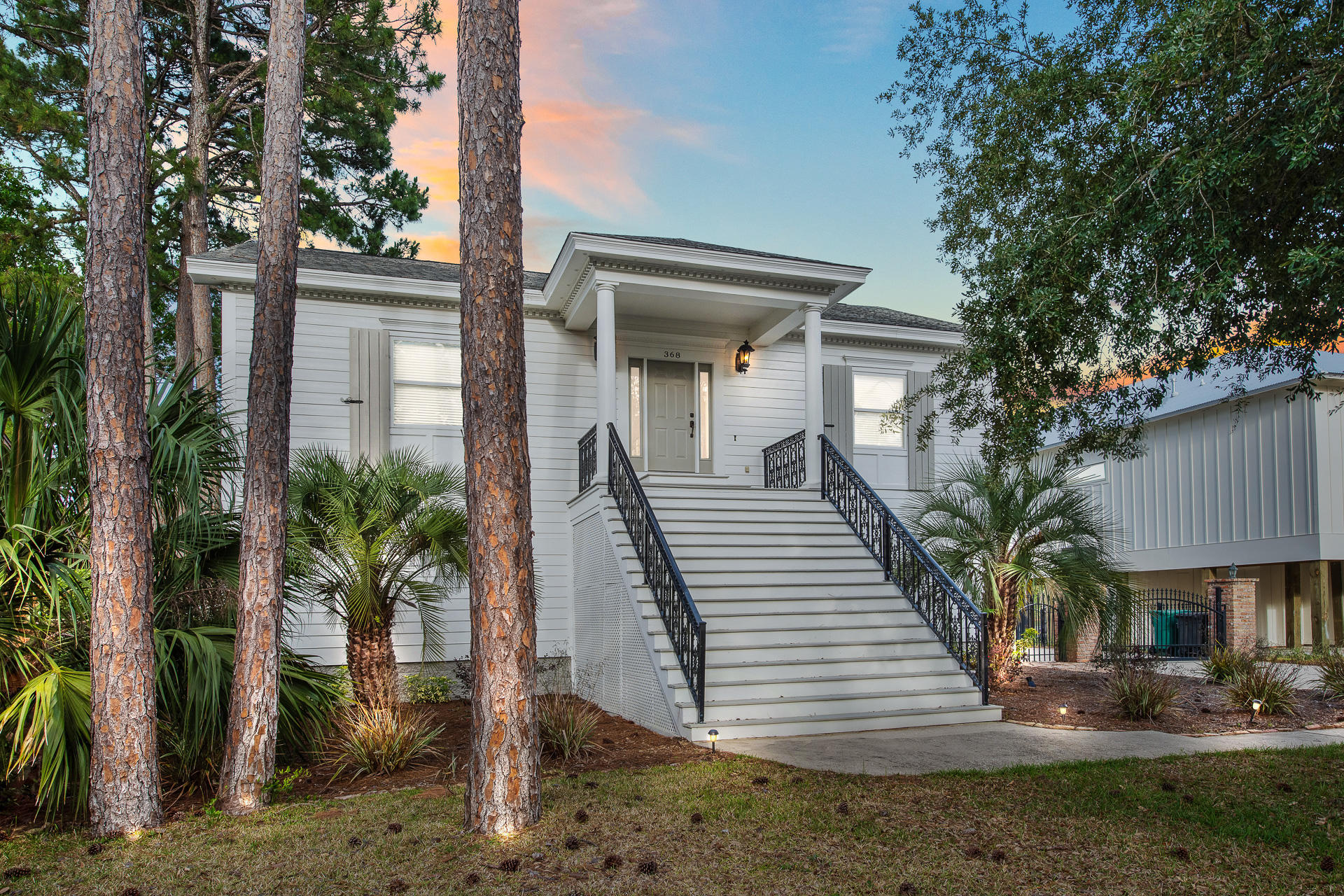 368 West Harborview Road Santa Rosa Beach, FL 32459 - Photo 8 of 60 a view of a house with backyard and trees