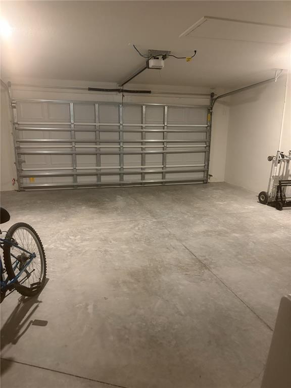 587 North Riva Ridge Path Inverness, FL 34453 - Photo 22 of 44 a view of a garage with furniture