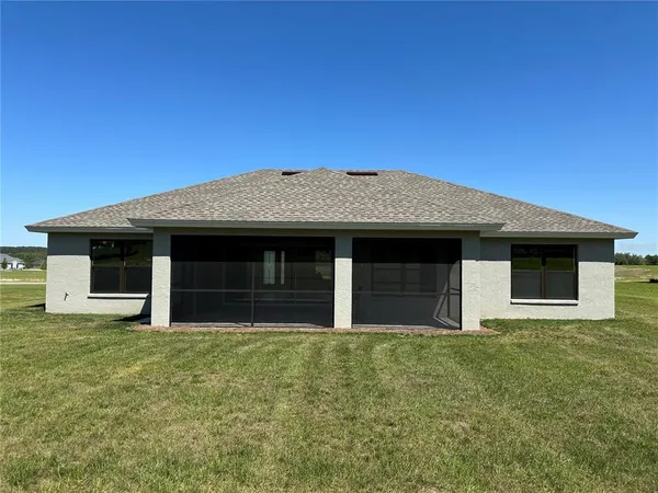 a front view of a house with yard