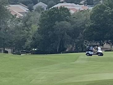 587 North Riva Ridge Path Inverness, FL 34453 - Photo 28 of 42 a view of a field with an outdoor space