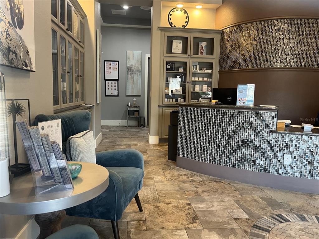 587 North Riva Ridge Path Inverness, FL 34453 - Photo 35 of 44 a living room with furniture and a couch