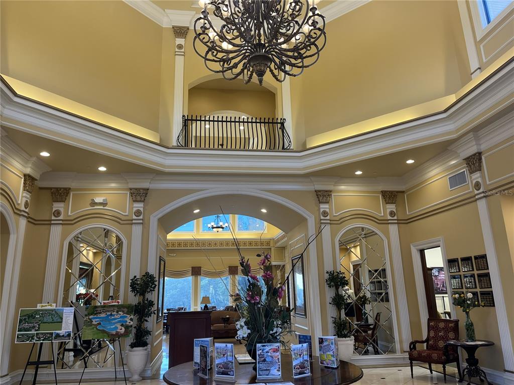 587 North Riva Ridge Path Inverness, FL 34453 - Photo 40 of 44 a view of a entryway with a chandelier
