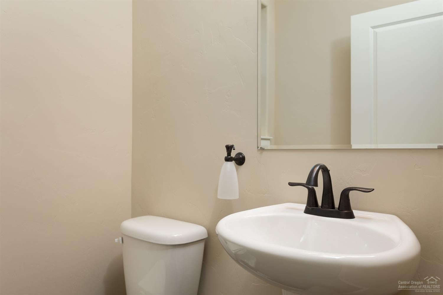 20945 Sotra Loop Bend, OR 97702 - Photo 9 of 25 Conveniently located half bath on first