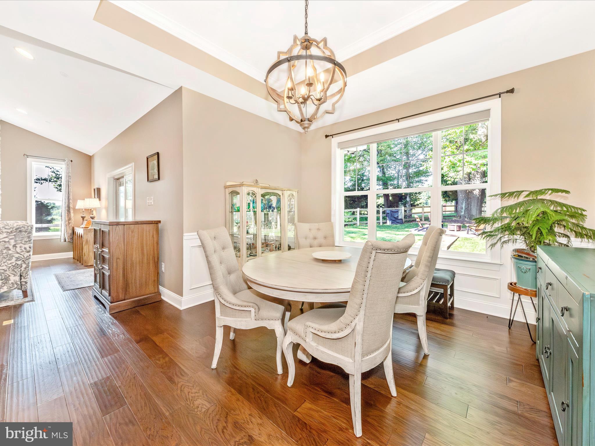 7788 Old Receiver Road Frederick, MD 21702 - Photo 18 of 51 a view of a dining room with furniture window and wooden floor
