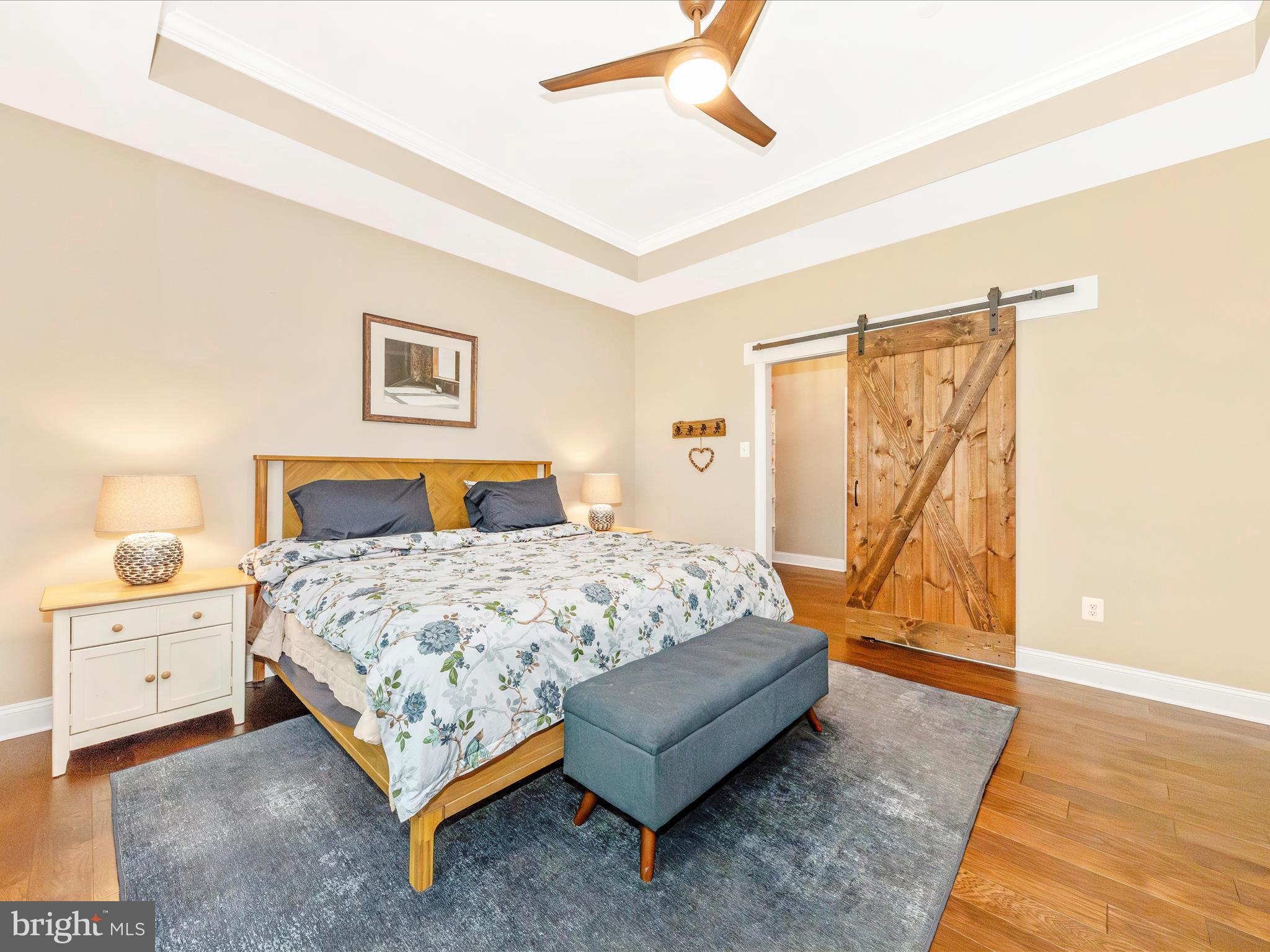 7788 Old Receiver Road Frederick, MD 21702 - Photo 21 of 51 a bedroom with a large bed and a night stand