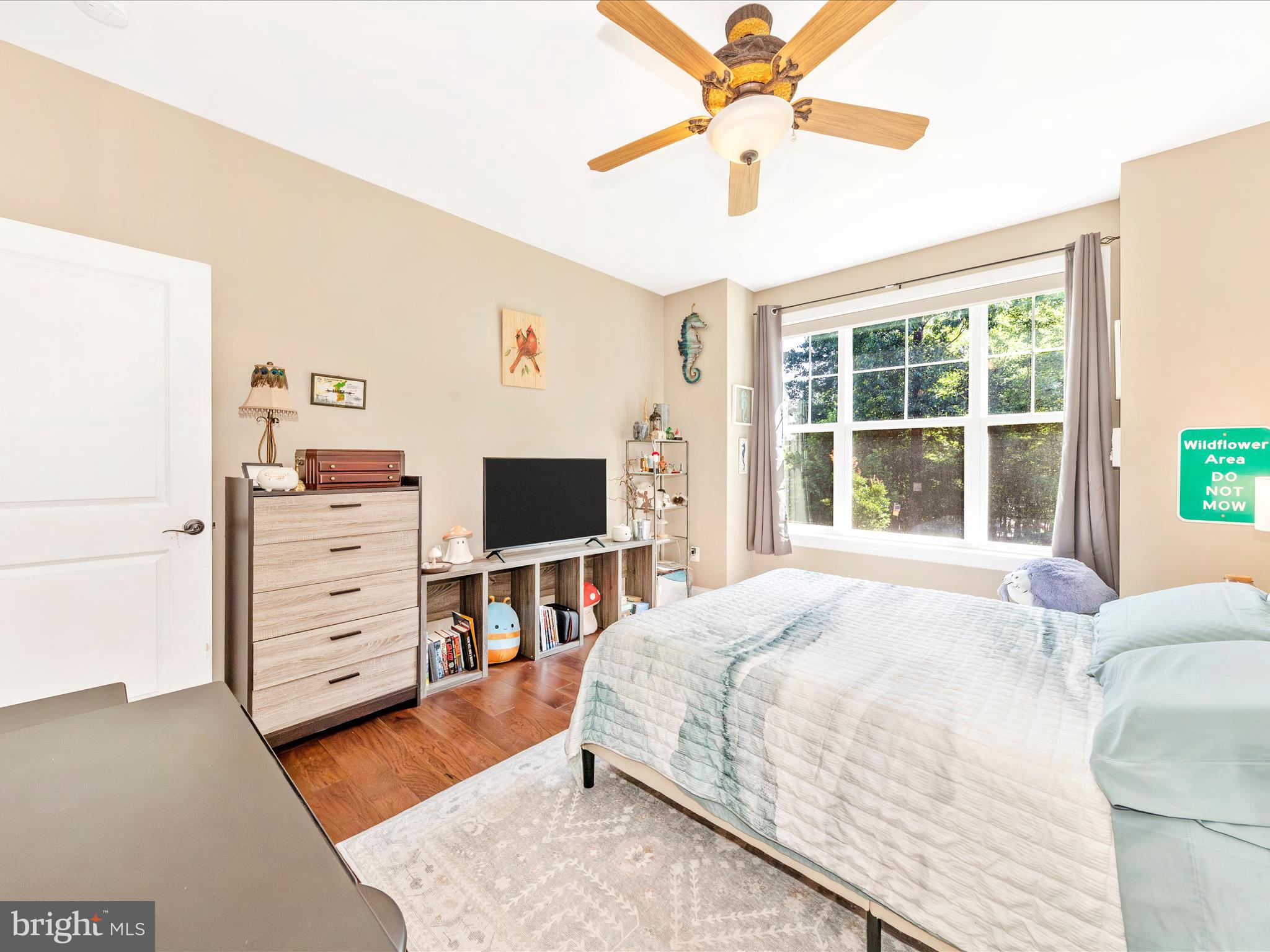7788 Old Receiver Road Frederick, MD 21702 - Photo 26 of 51 a bedroom with a bed and a flat screen tv