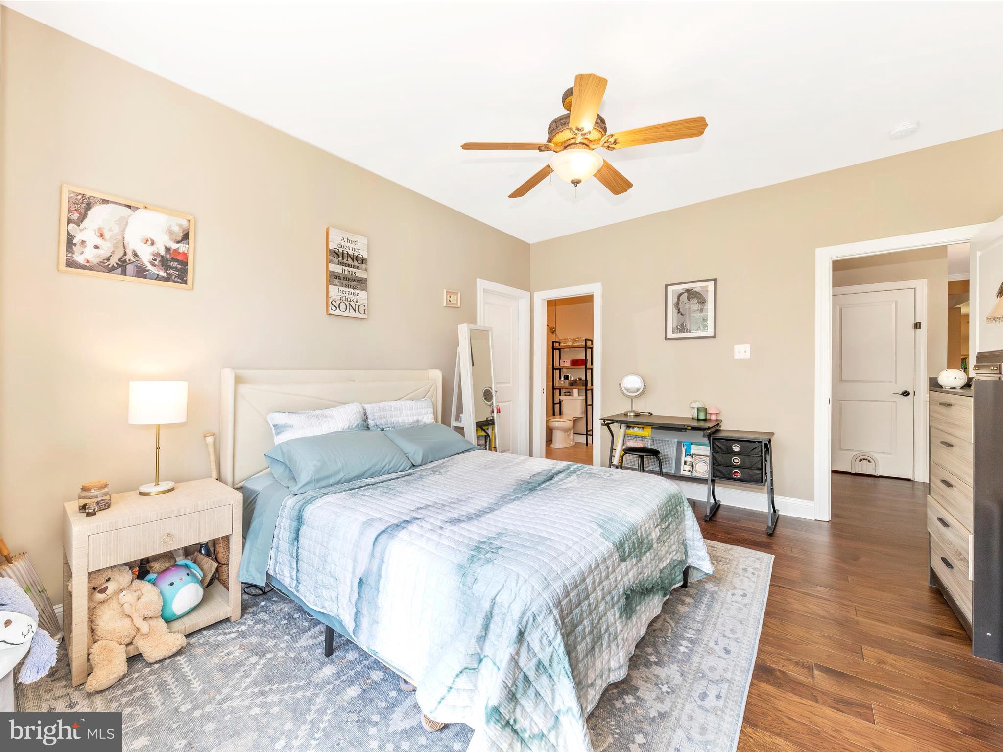 7788 Old Receiver Road Frederick, MD 21702 - Photo 27 of 51 a bedroom with a bed and a chandelier